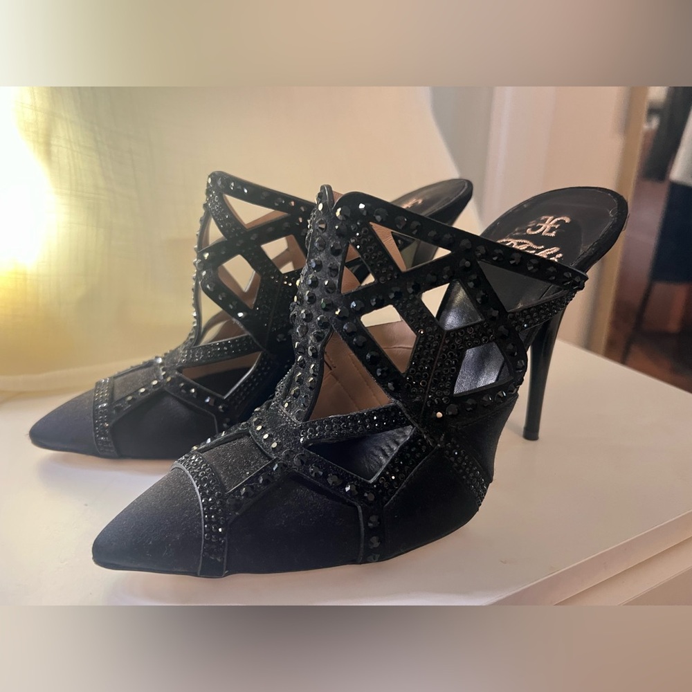 Elegant Black Studded Women's Heels
Fabi women’s size 38.5 eu, size 8 US